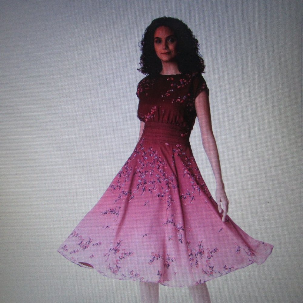 WIDE BANDED EMPIRE WAIST FIT AND FLARE DRESS.
